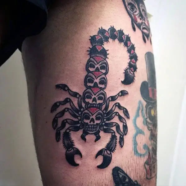 guys-skulls-scorpion-tattoo-on-thigh-with-traditional-design