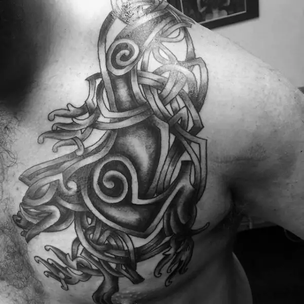 celtic-tribal-boar-mens-shoulder-and-chest-tattoo