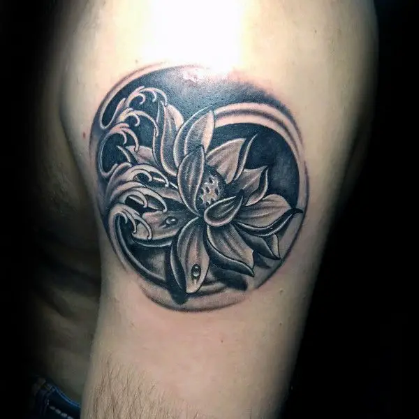 circular-lotus-flower-mens-waves-tattoo-on-upper-arm