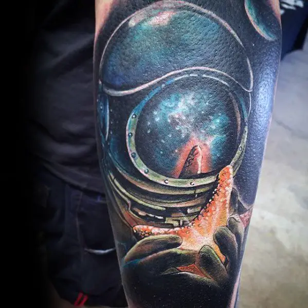 diver-with-glowing-star-fish-3d-forearm-sleeve-tattoo-on-men