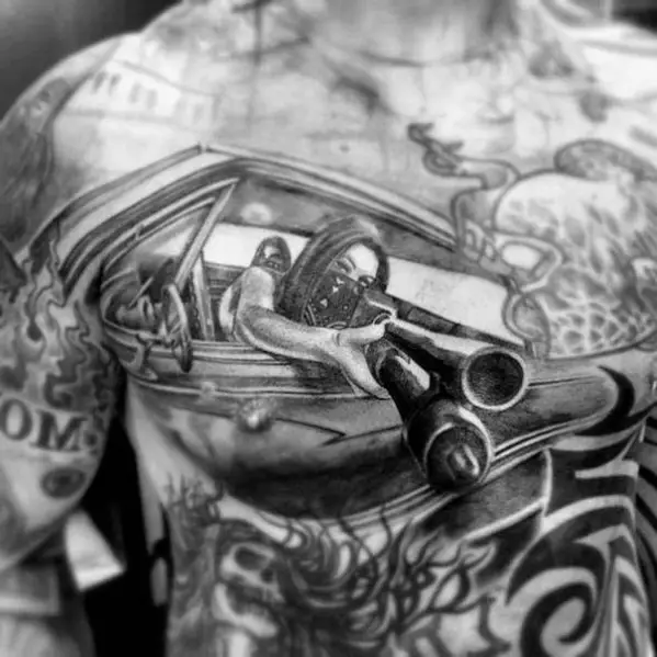 gentleman-with-3d-chicano-chest-shotgun-tattoo