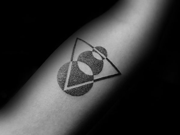 guy-with-dotwork-negative-space-triangle-circle-simple-forearm-tattoo