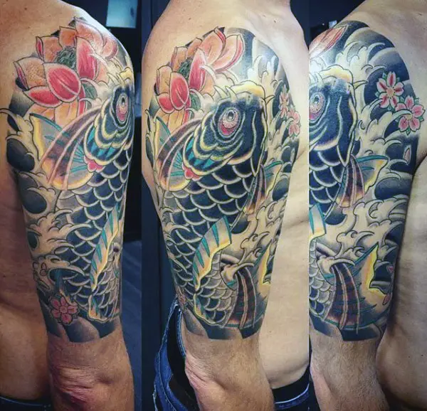 guy-with-koi-fish-flower-tattoo-on-arm