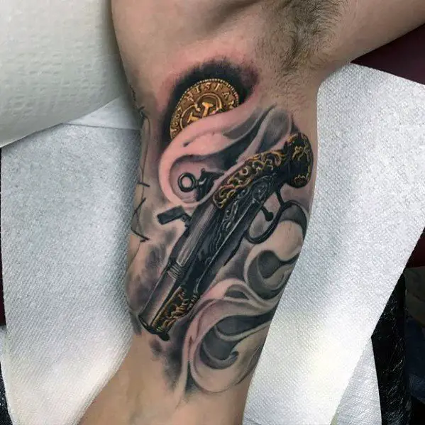 guy-with-shotgun-tattoo