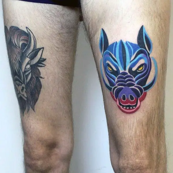 modern-mens-boar-thigh-tattoo-with-artistic-design