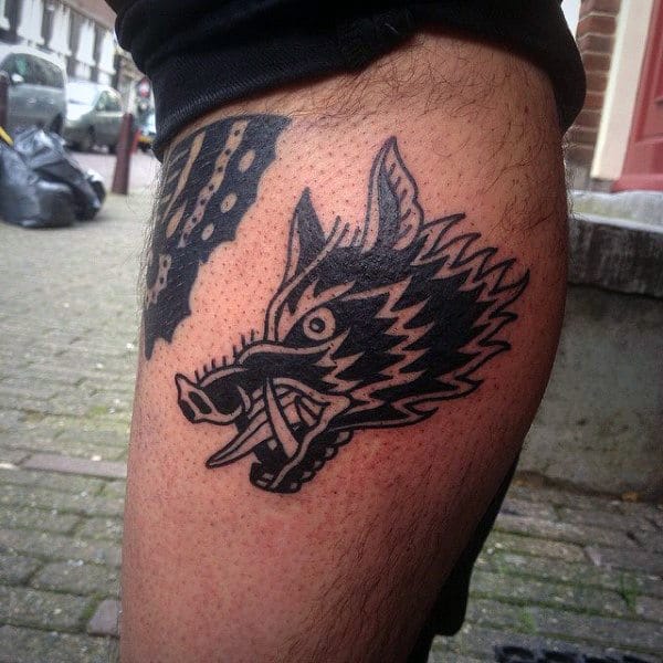 small-simple-mens-old-school-boar-leg-tattoo-with-black-ink-design