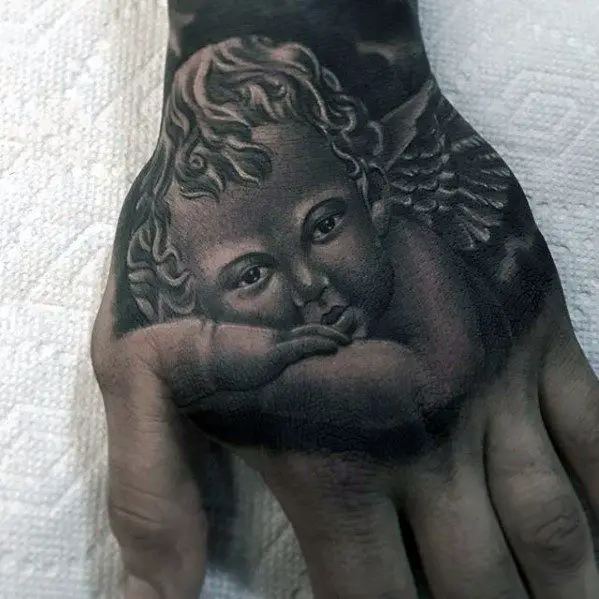 angel-hand-guys-tattoo-cover-up-ideas