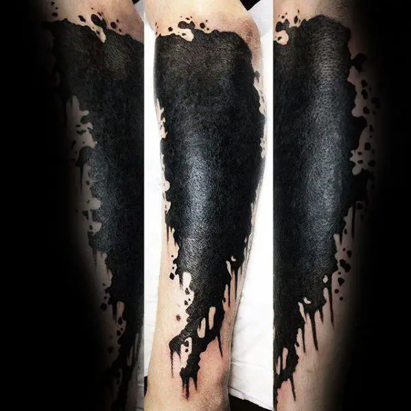 black-ink-paint-splatter-guys-tattoo-cover-up-ideas-on-leg