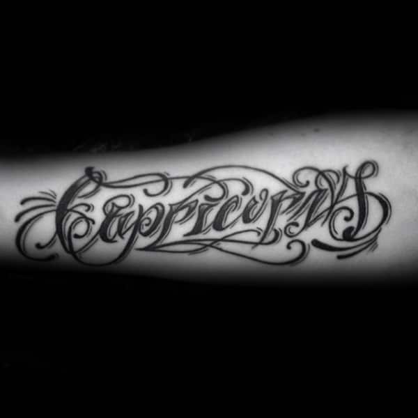 capricorn-lettering-mens-word-tattoos-on-inner-forearms