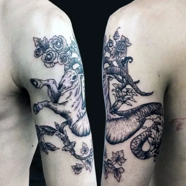 capricorn-mens-arm-tattoo-with-black-ink-floral-design