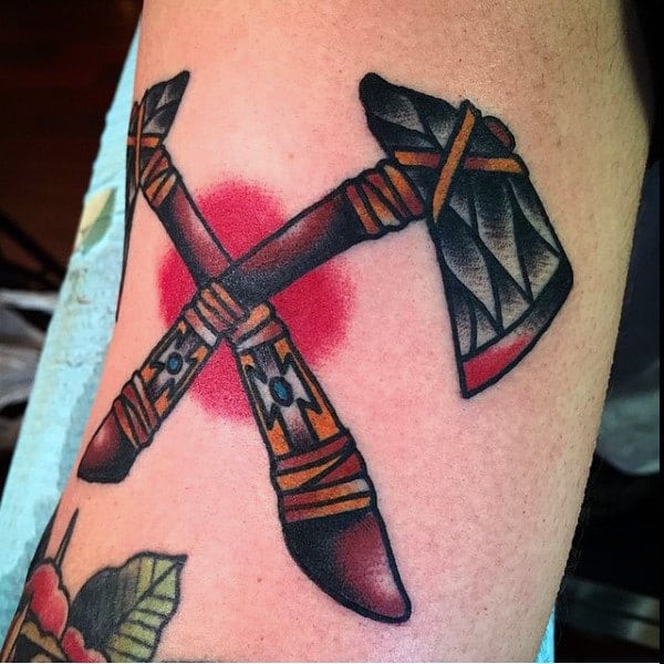 double-crossed-tomahawks-tattoo-for-men-on-arm