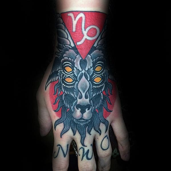 double-eyed-goat-mens-capricorn-symbol-hand-tattoos