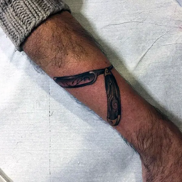 gorgeous-straight-razor-tattoo-male-forearms