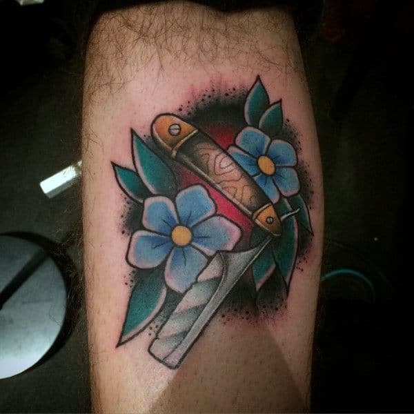 guys-forearms-blue-florals-and-straight-razor-tattoo