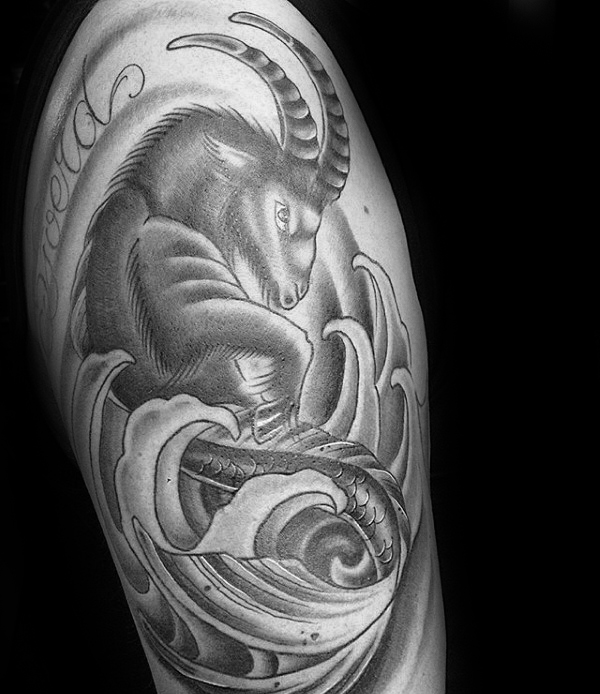 guys-water-waves-capricorn-goat-tattoo-on-upper-arm