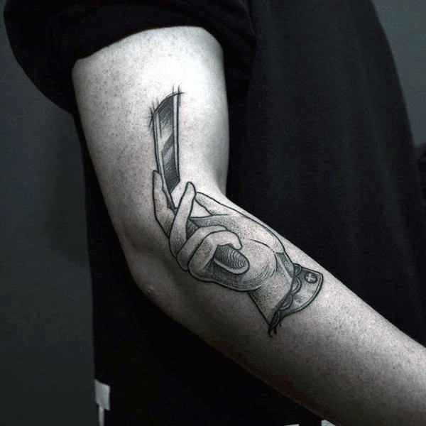 hand-holding-straight-razor-tattoo-male-arms