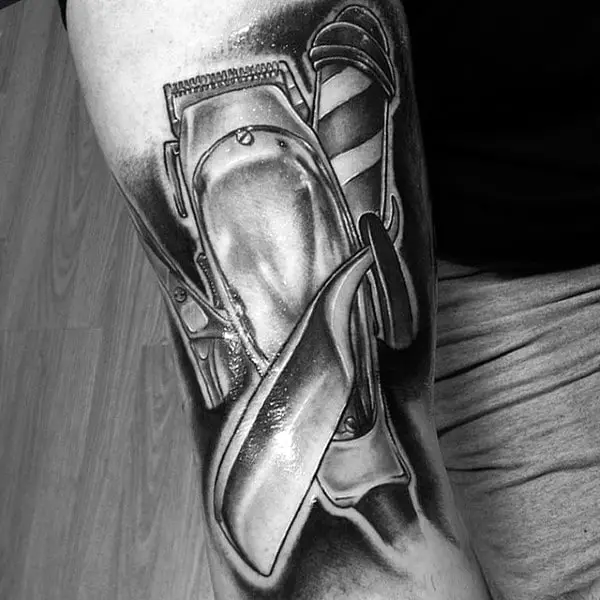 large-mettalic-blade-straight-razor-tattoo-male-forearms