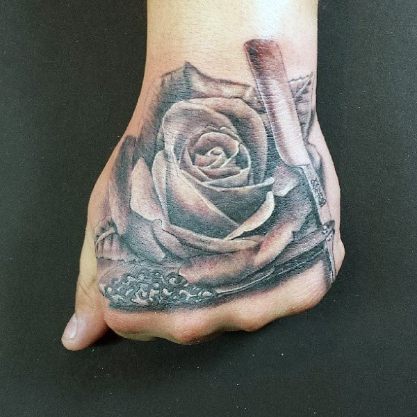 lovely-grey-rose-and-straight-razor-tattoo-male-hands