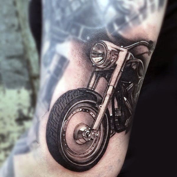 male-with-arm-tattoo-of-vintage-bike-harley-davidson-tattoo-ideas