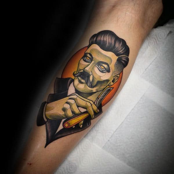 man-holding-straight-razor-tattoo-forearms