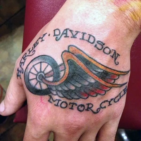 simple-traditional-harley-davidson-wheel-with-wings-male-tattoos