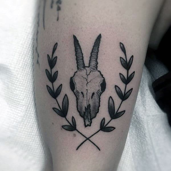 small-simple-mens-goat-skull-with-olive-branch-capricorn-tattoo