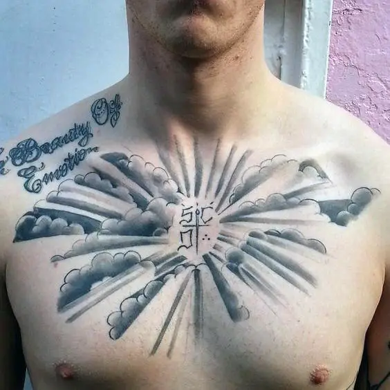 clouds-guys-black-and-grey-ink-shaded-upper-chest-tattoo