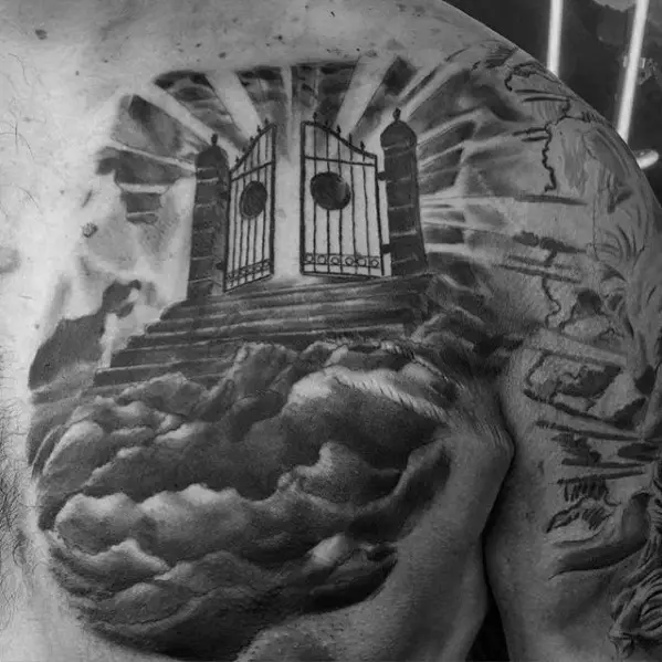 gates-of-heaven-clouds-male-shaded-upper-chest-tattoo