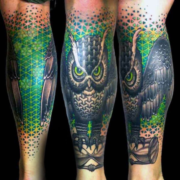 geometric-owl-green-and-black-mens-leg-tattoo