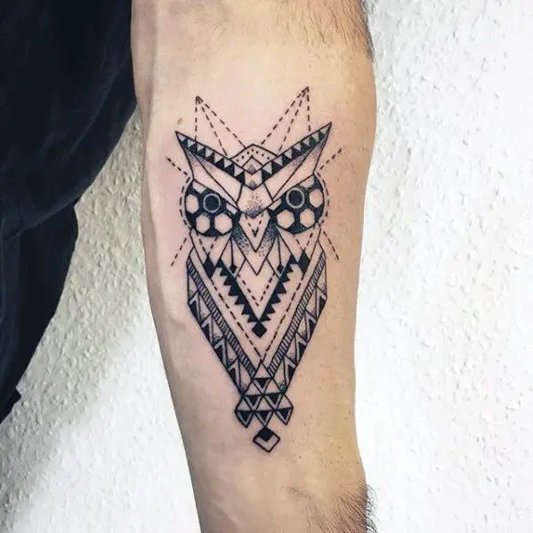 guy-with-cool-geometric-owl-tattoo-design-on-inner-forearm