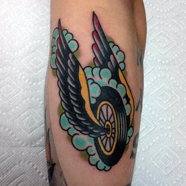 guy-with-motorcycle-tattoo-small-design