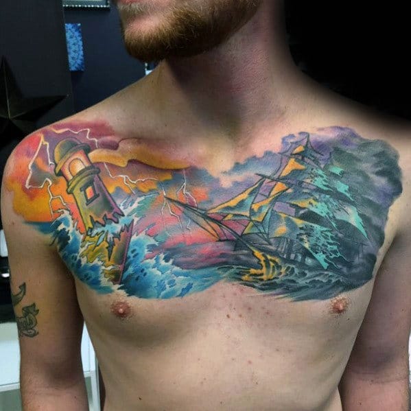sunset-clouds-with-sailing-ship-mens-watercolor-upper-chest-tattoo-designs