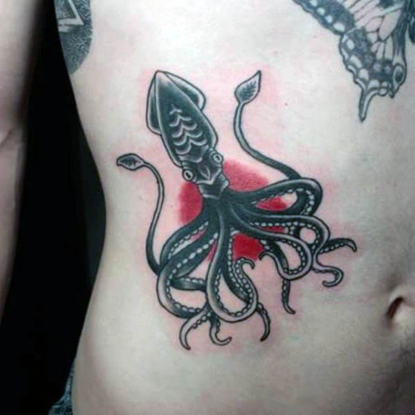 black-squid-rib-cage-side-male-tattoo-with-red-dot
