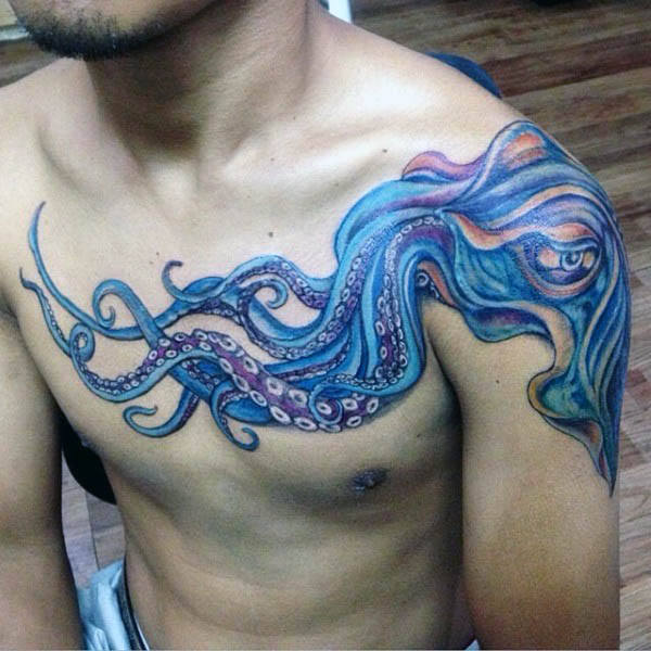 chest-and-shoulder-squid-tattoo-for-men-in-blue-ink