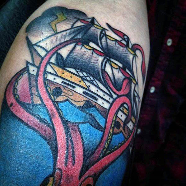 color-small-mens-squid-tattoo-with-sailboat-wrapped-in-tentacles