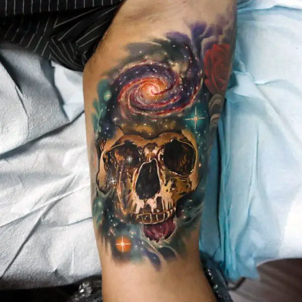 coolest-outer-space-gold-skull-mens-arm-tattoo-designs