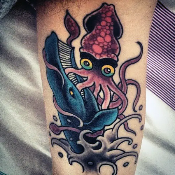 mens-squid-tattoo-attacking-whale-on-bicep