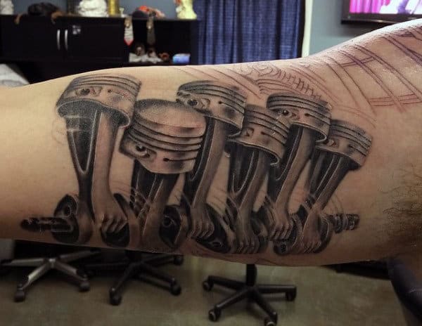 bicep-car-tattoo-designs-for-men-with-pistons