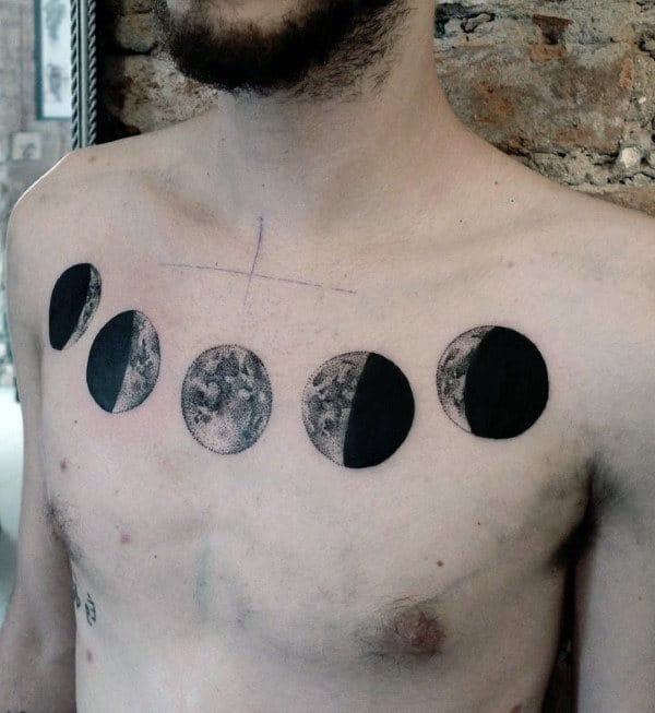black-ink-detailed-mens-moon-phases-upper-chest-tattoos