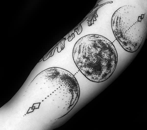detailed-male-moon-phases-outer-forearm-dotwork-tattoo-ideas