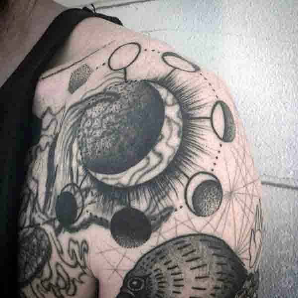 gentleman-with-moon-phases-shoulder-tattoo