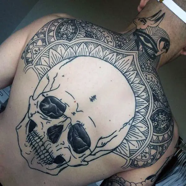 skull-ornate-pattern-male-upper-back-tattoo-ideas