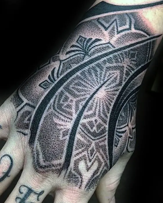 male-tattoo-with-geometric-hand-design