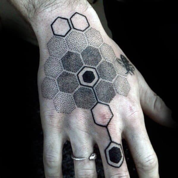 male-with-cool-geometric-hexagon-shapes-hand-tattoo-design