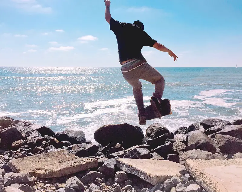skater-going-for-an-epic-jump-along-the-california