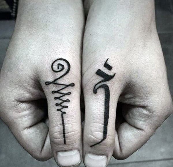 black-ink-guys-thumb-tatto-design-inspiration