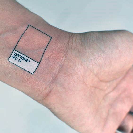 creative-color-block-square-with-white-ink-on-mans-wrist