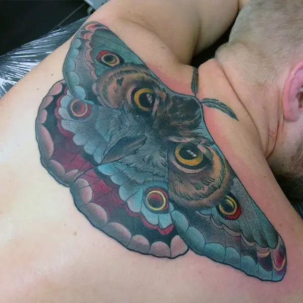 creative-moth-with-owl-eyes-mens-back-tattoos