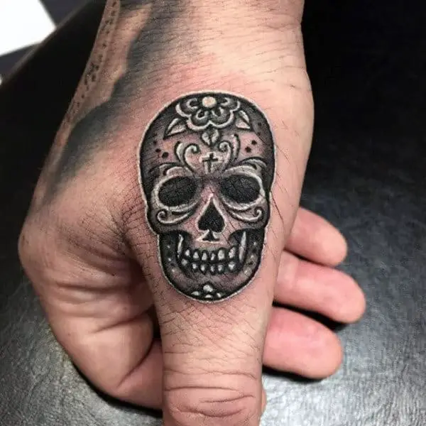day-of-the-dead-guys-thumb-skull-tattoo