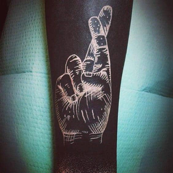 fingers-crossed-mens-white-ink-tattoo-over-black